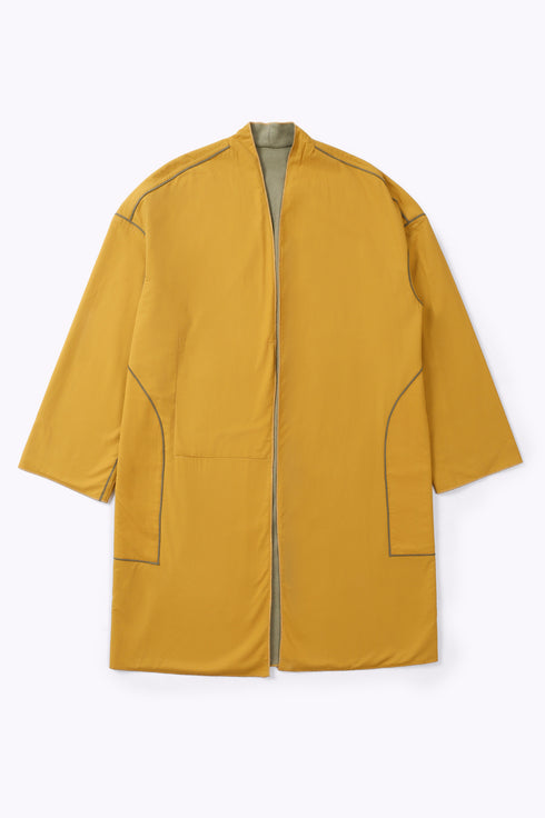 Reversible coat with front embroidered pocket