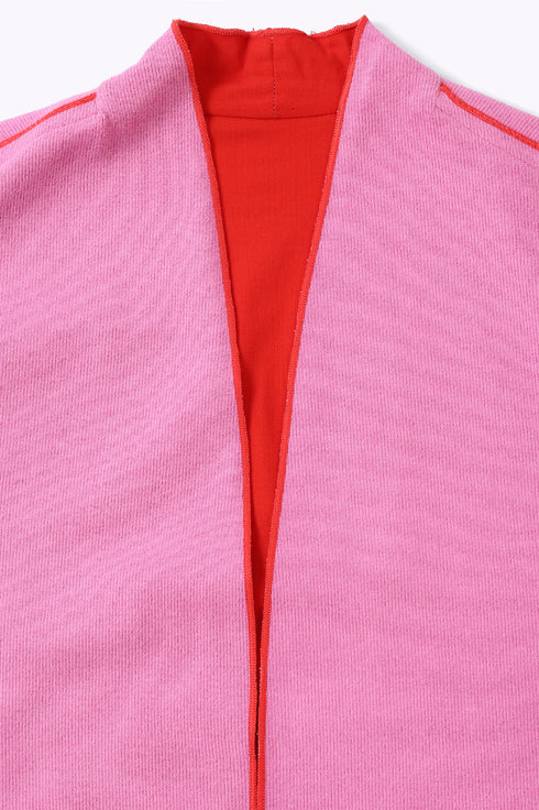 Reversible coat with front embroidered pocket