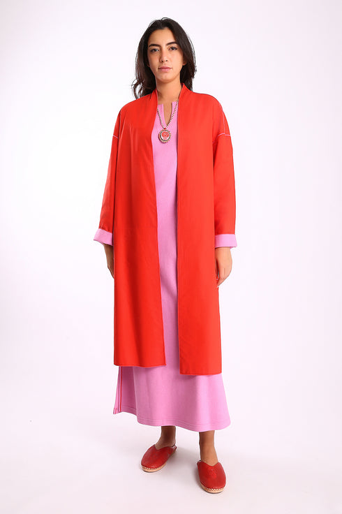 Reversible coat with front embroidered pocket