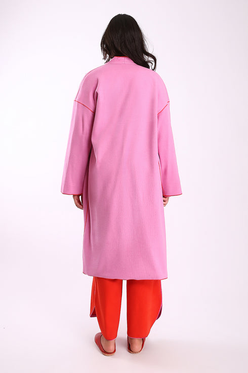 Reversible coat with front embroidered pocket