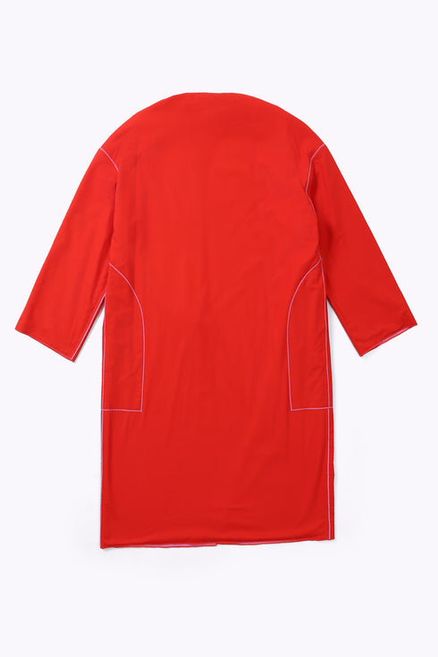 Reversible coat with front embroidered pocket