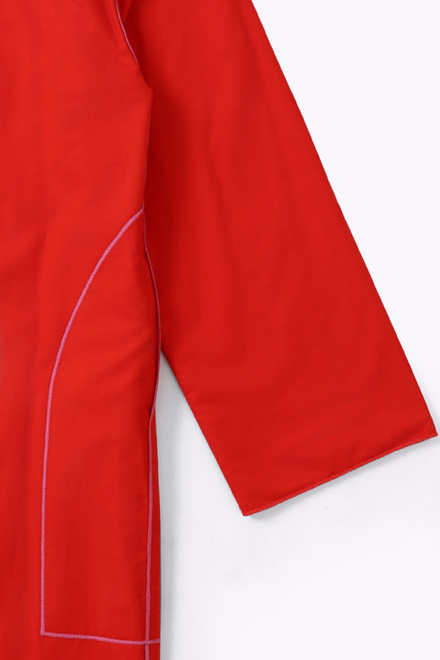 Reversible coat with front embroidered pocket