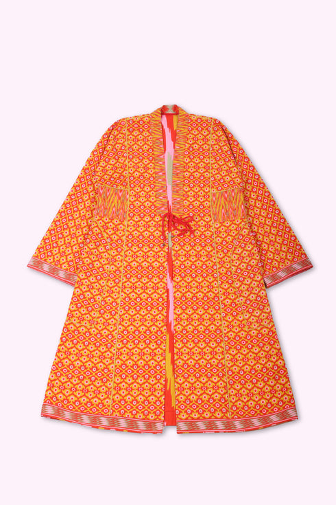 Reversible coat in printed cotton gabardine with pockets