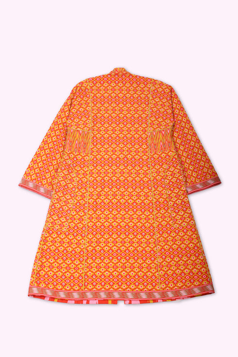 Reversible coat in printed cotton gabardine with pockets