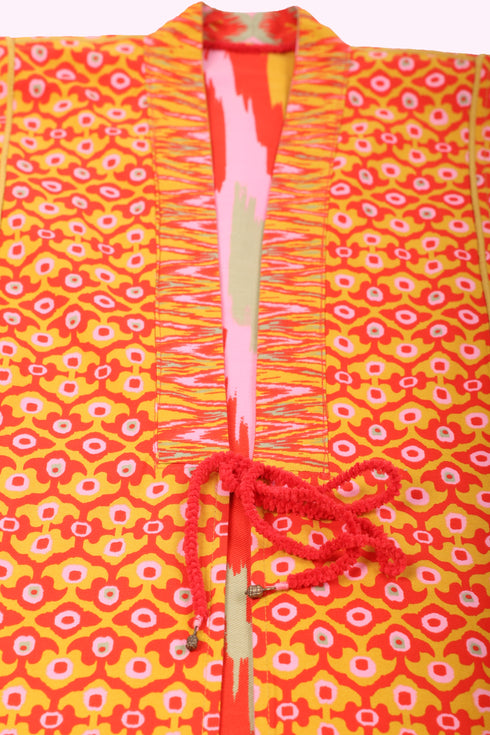 Reversible coat in printed cotton gabardine with pockets