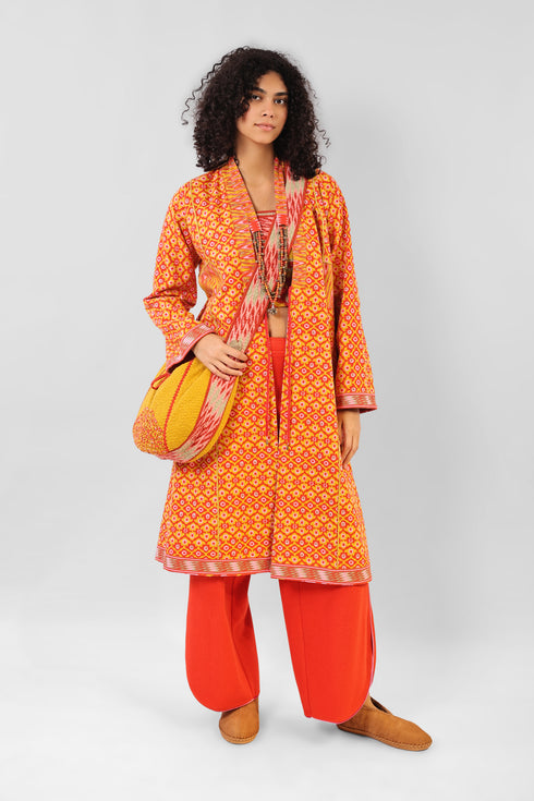 Reversible coat in printed cotton gabardine with pockets