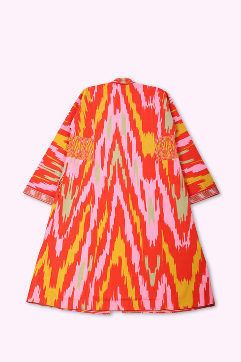 Reversible coat in printed cotton gabardine with pockets