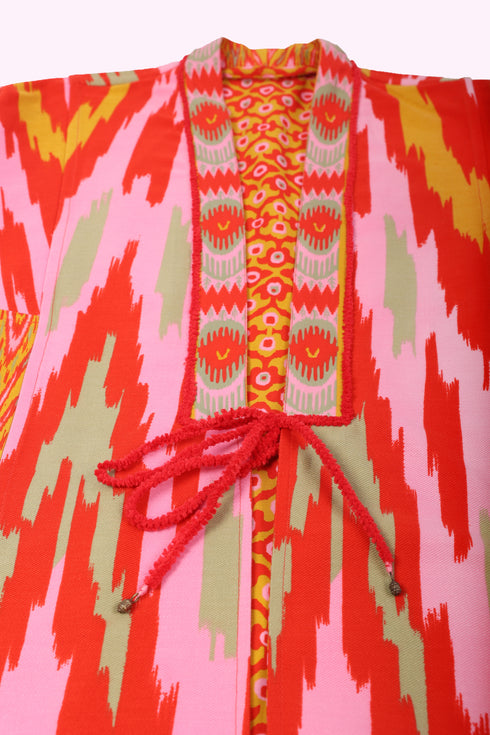 Reversible coat in printed cotton gabardine with pockets