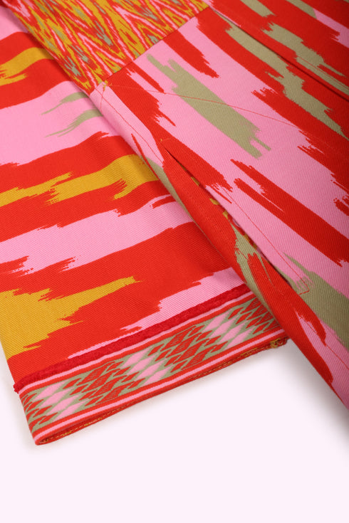 Reversible coat in printed cotton gabardine with pockets