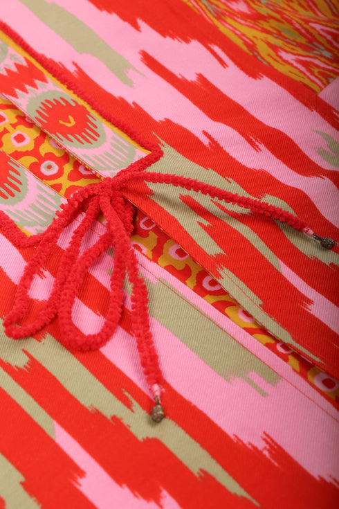 Reversible coat in printed cotton gabardine with pockets