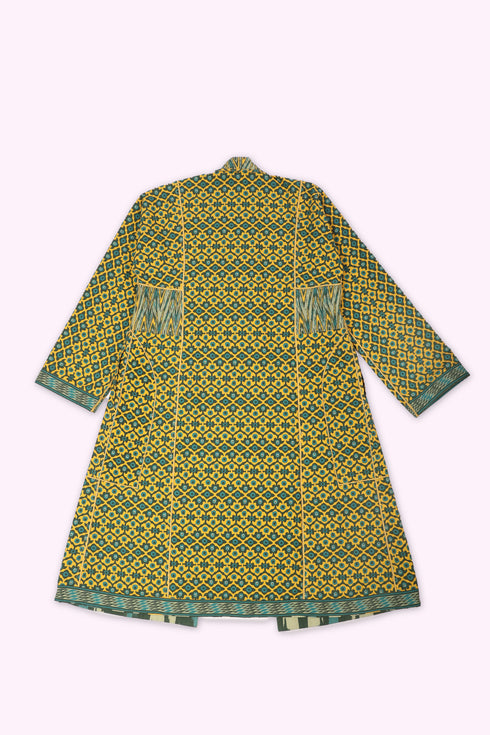Reversible coat in printed cotton gabardine with pockets