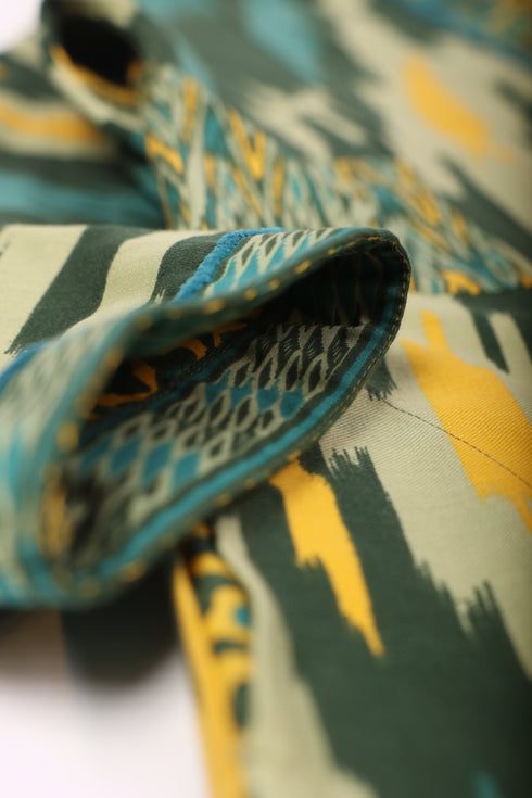 Reversible coat in printed cotton gabardine with pockets