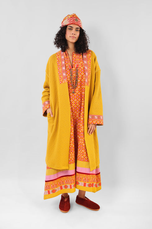 Coat in quilted cotton blend with pockets