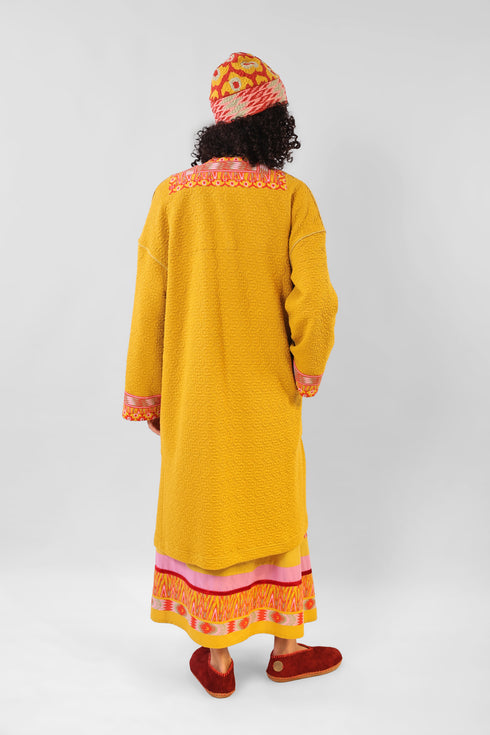 Coat in quilted cotton blend with pockets