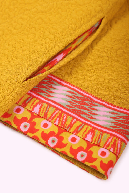 Coat in quilted cotton blend with pockets