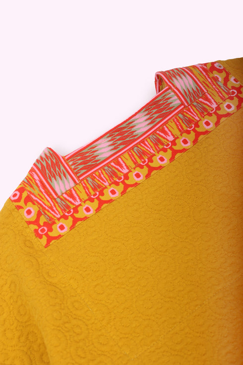 Coat in quilted cotton blend with pockets