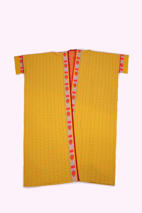 Reversible oversized coverup with one plain and one printed side