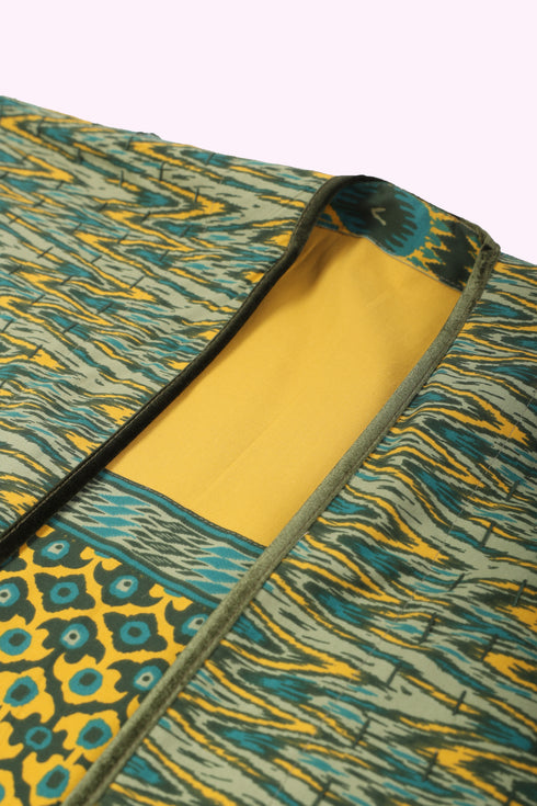 Reversible oversized coverup with one plain and one printed side