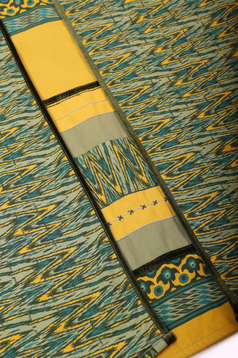 Reversible oversized coverup with one plain and one printed side