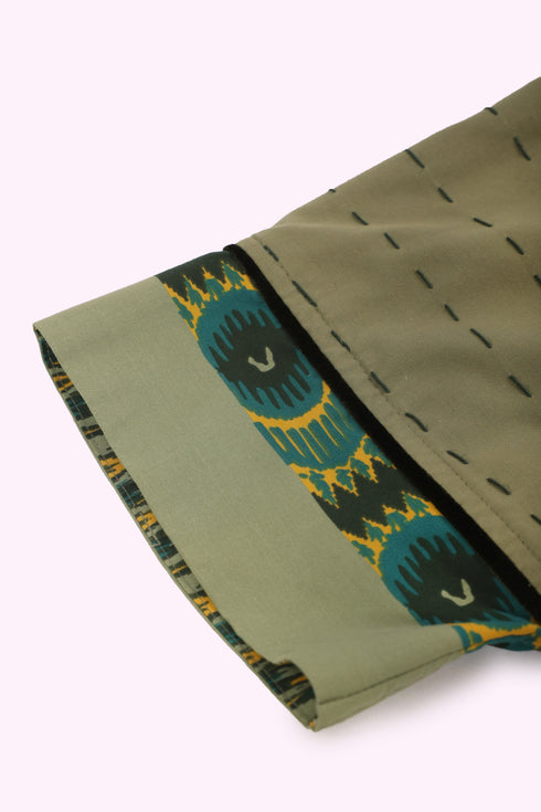 Reversible oversized coverup with one plain and one printed side