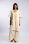 Loose fit coverup in linen and cotton with front and back bib