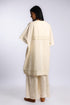 Loose fit coverup in linen and cotton with front and back bib
