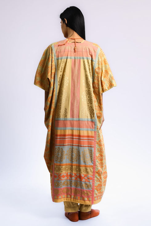Reversible oversize coverup with one printed side and one plain