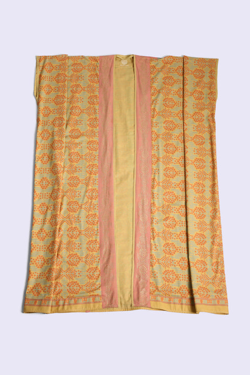 Reversible oversize coverup with one printed side and one plain
