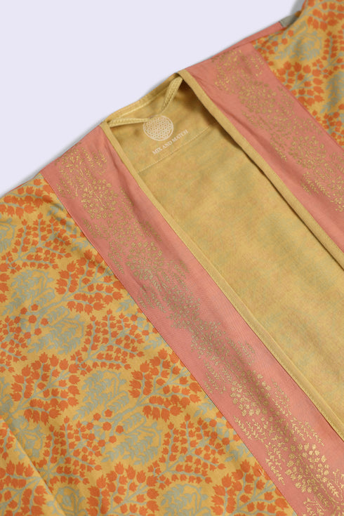 Reversible oversize coverup with one printed side and one plain