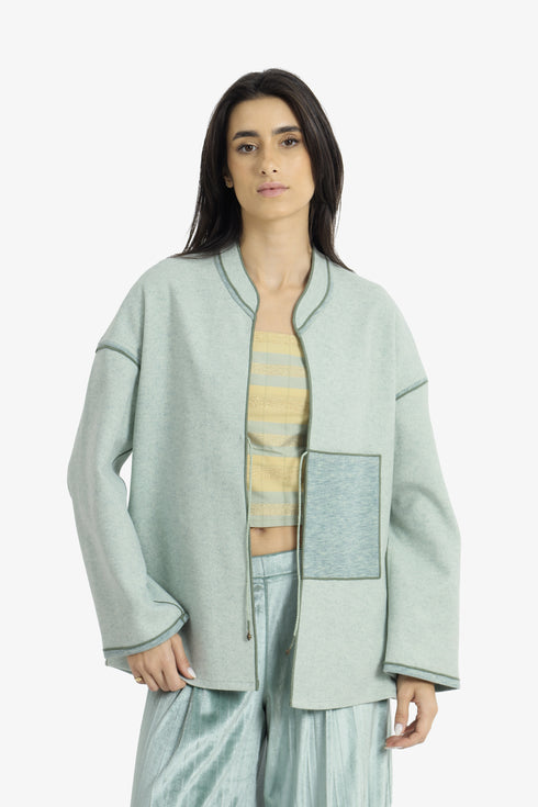 Reversible short jacket with front pocket