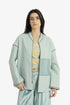 Reversible short jacket with front pocket