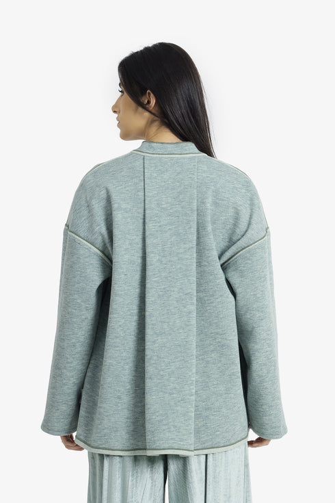 Reversible short jacket with front pocket