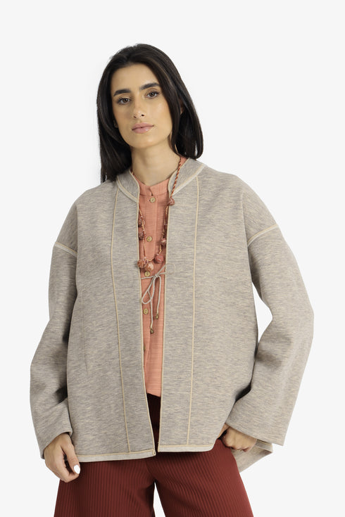 Reversible short jacket with front pocket