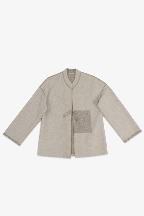 Reversible short jacket with front pocket