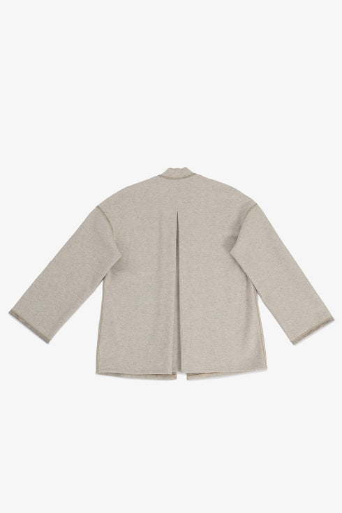 Reversible short jacket with front pocket