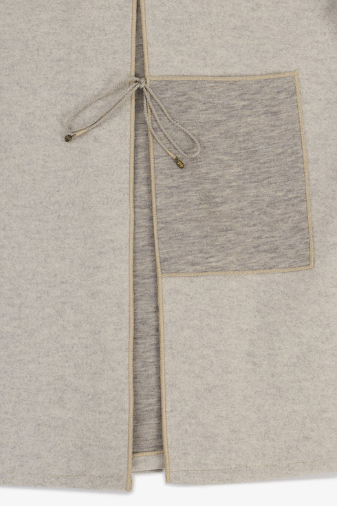 Reversible short jacket with front pocket