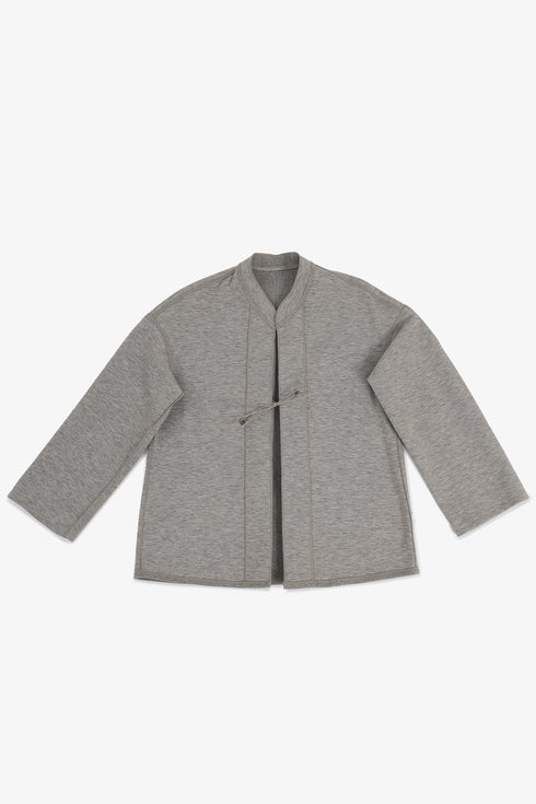 Reversible short jacket with front pocket