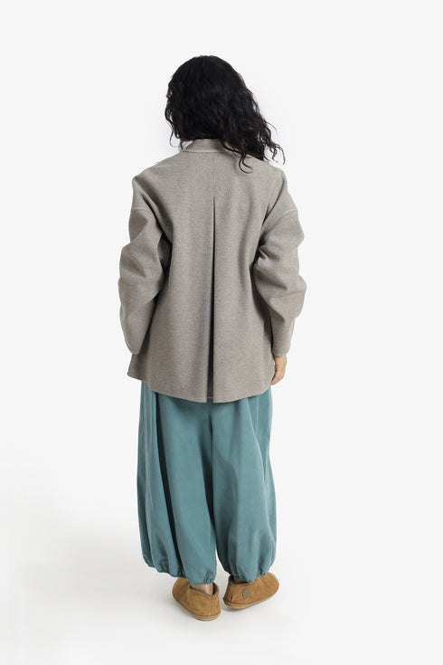 Reversible short jacket with front pocket