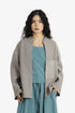 Reversible short jacket with front pocket