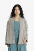 Reversible short jacket with front pocket