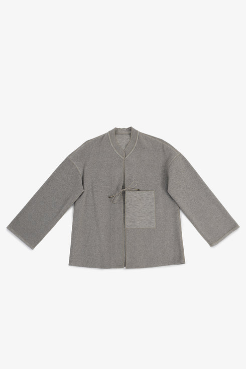 Reversible short jacket with front pocket