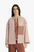 Reversible short jacket with back pleat