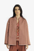 Reversible short jacket with back pleat