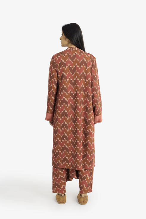 Quilted Ikat print coat with velvet cuffs