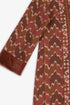 Quilted Ikat print coat with velvet cuffs