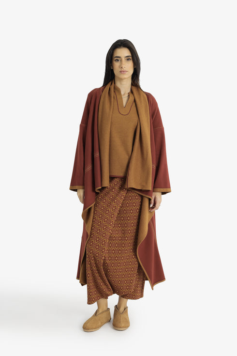 Draped collar coat with contrast stitching