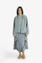 Draped collar coat with contrast stitching