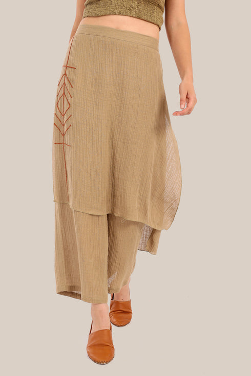 Pants with an embroidered asymmetric skirt