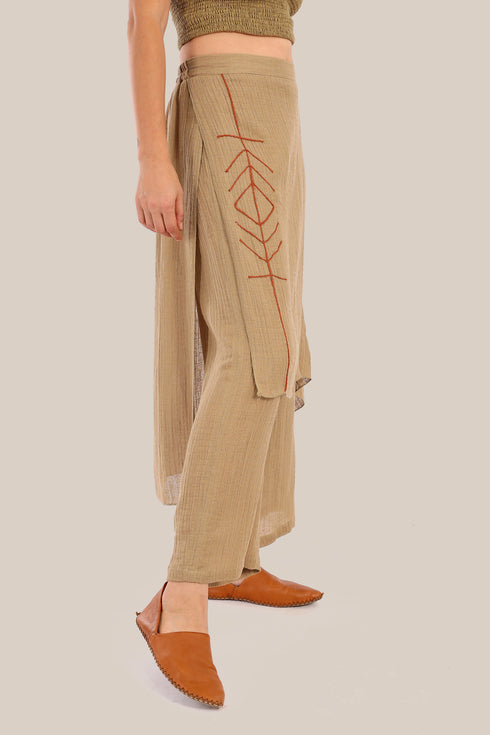 Pants with an embroidered asymmetric skirt