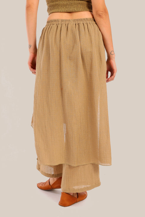 Pants with an embroidered asymmetric skirt
